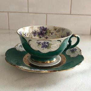 Lovely antique teal tea cup and saucer